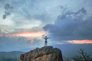 Standing on a mountain top