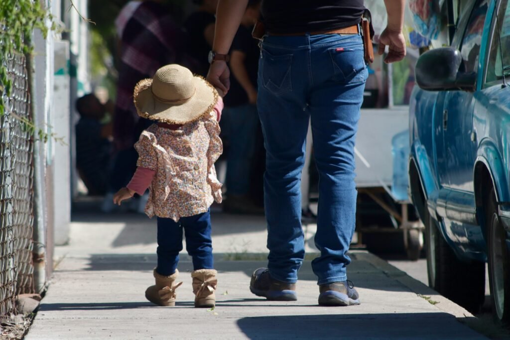 father and daughter walking