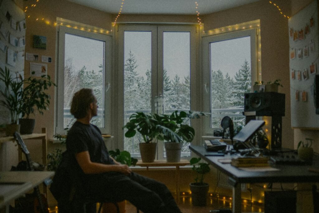 Man staring out of the window