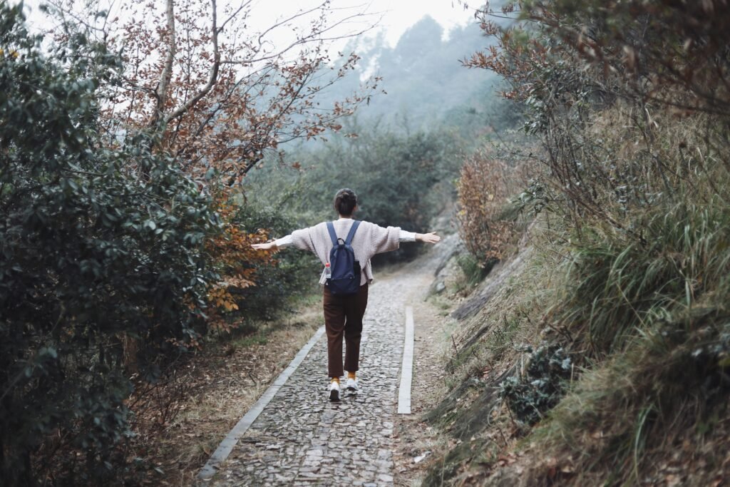 Person choosing a path representing limerence and healthy love after childhood trauma